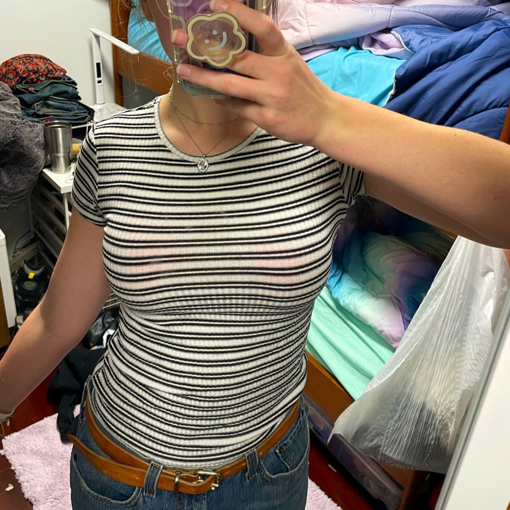 XS Max Studio black and white striped t-shirt.